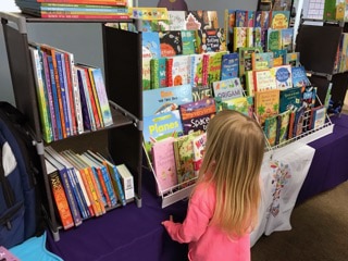 A girl choosing a book